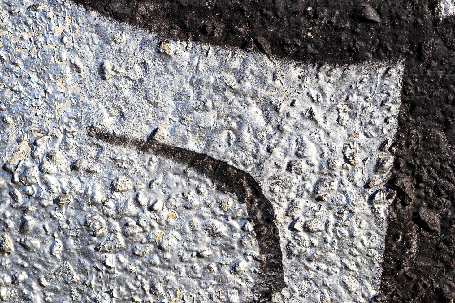 Fragment of colored graffiti painted on a concrete wall. Abstract background for design. photo