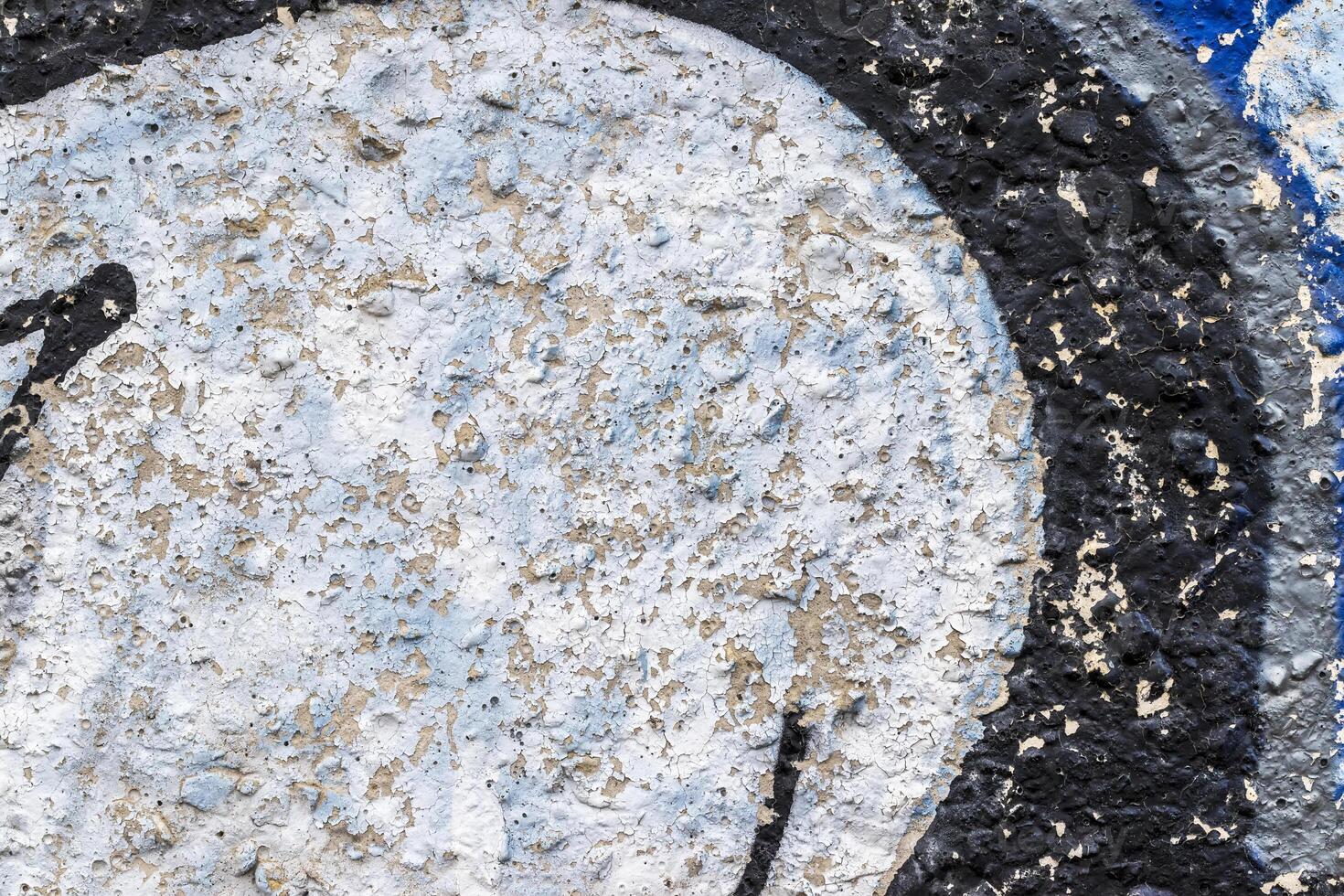 Graffiti painted on a concrete wall texture. photo