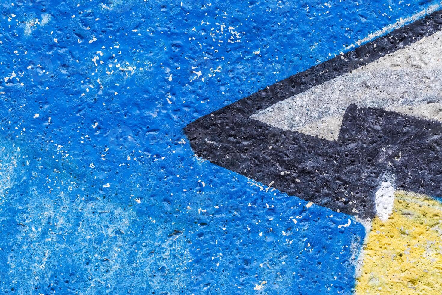Graffiti painted on a concrete wall texture. photo