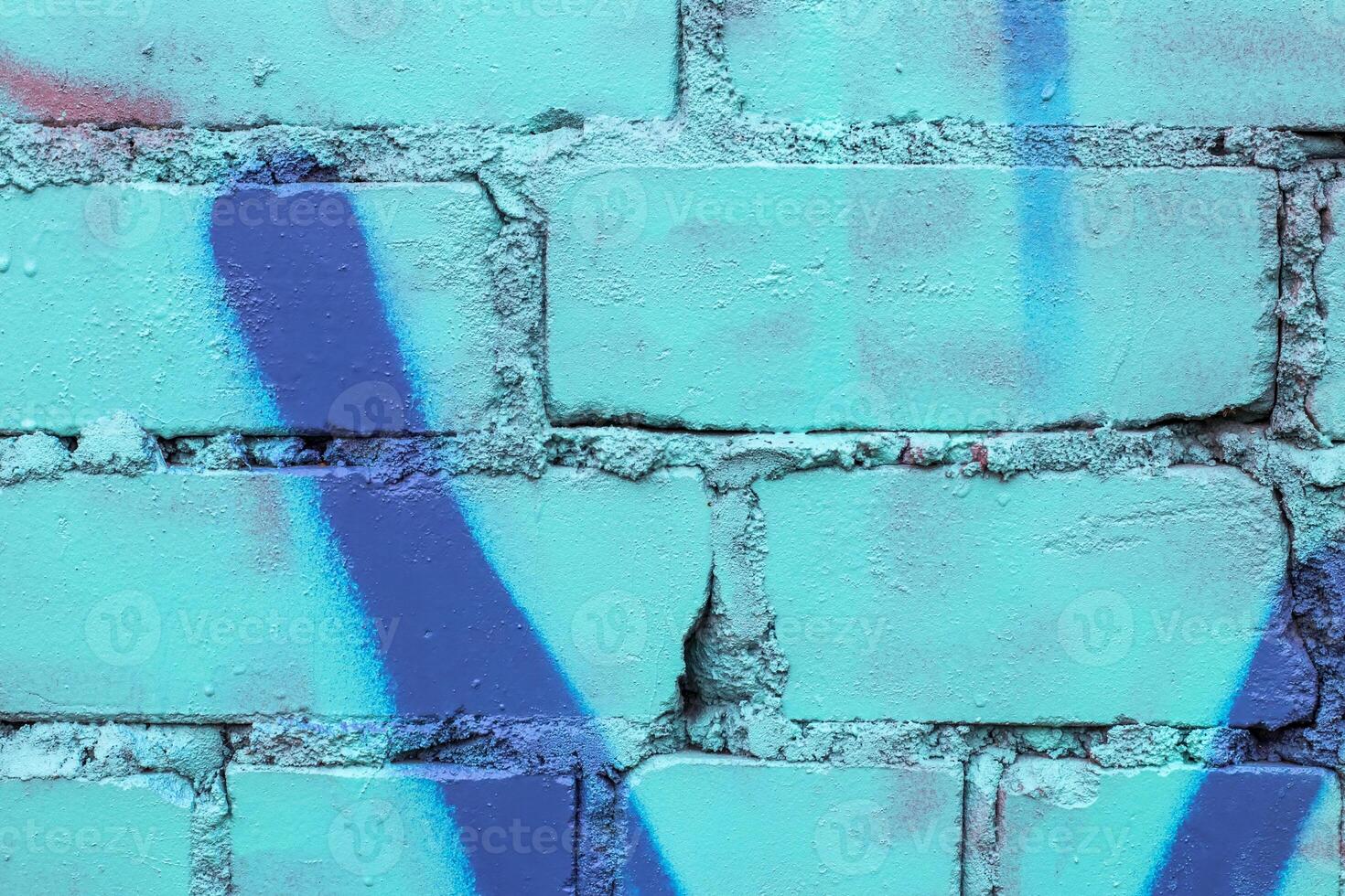 Graffiti painted on a brick wall texture. photo