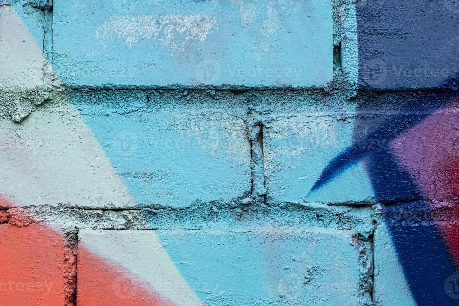 Graffiti painted on a brick wall texture. photo