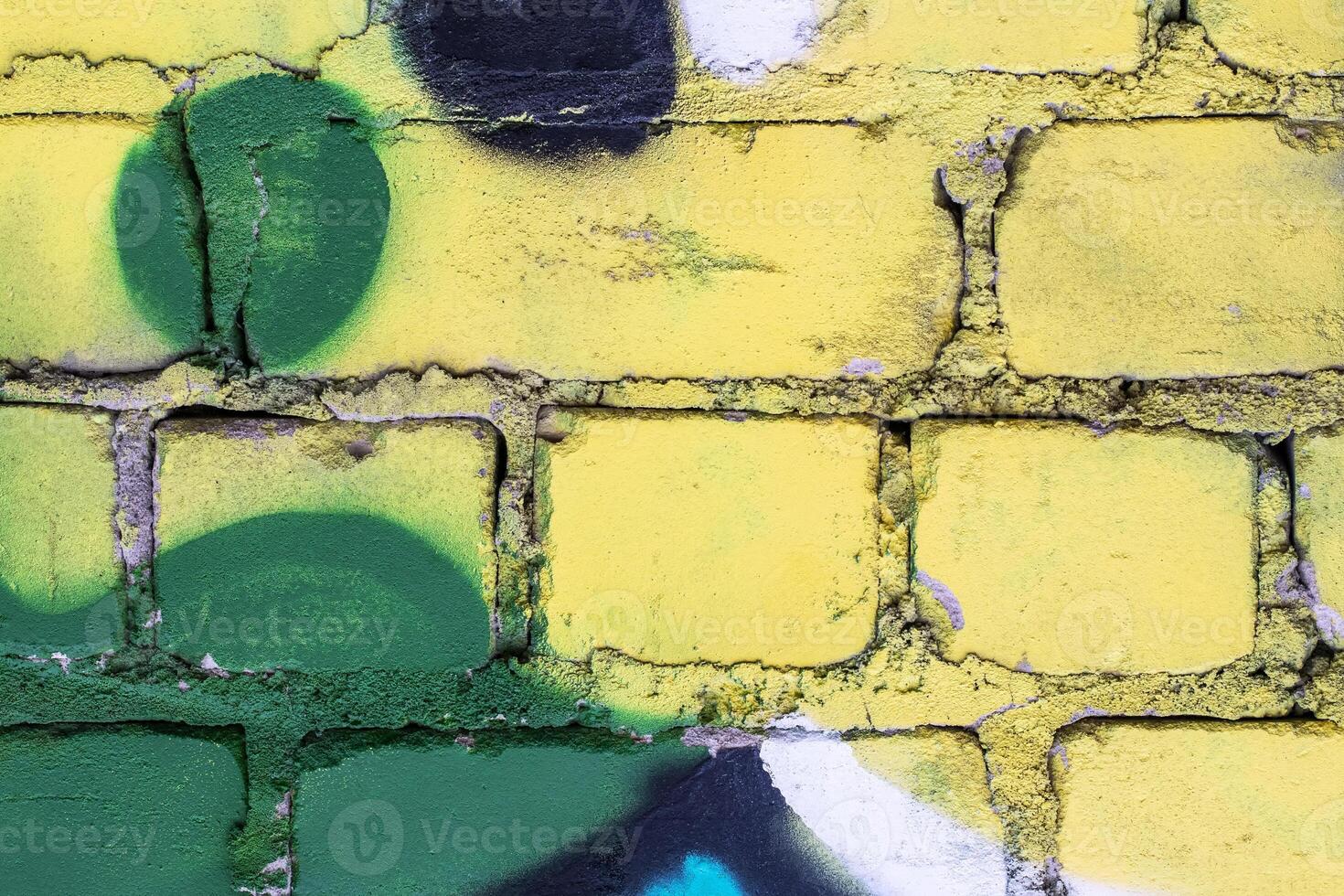Graffiti painted on a brick wall texture. photo