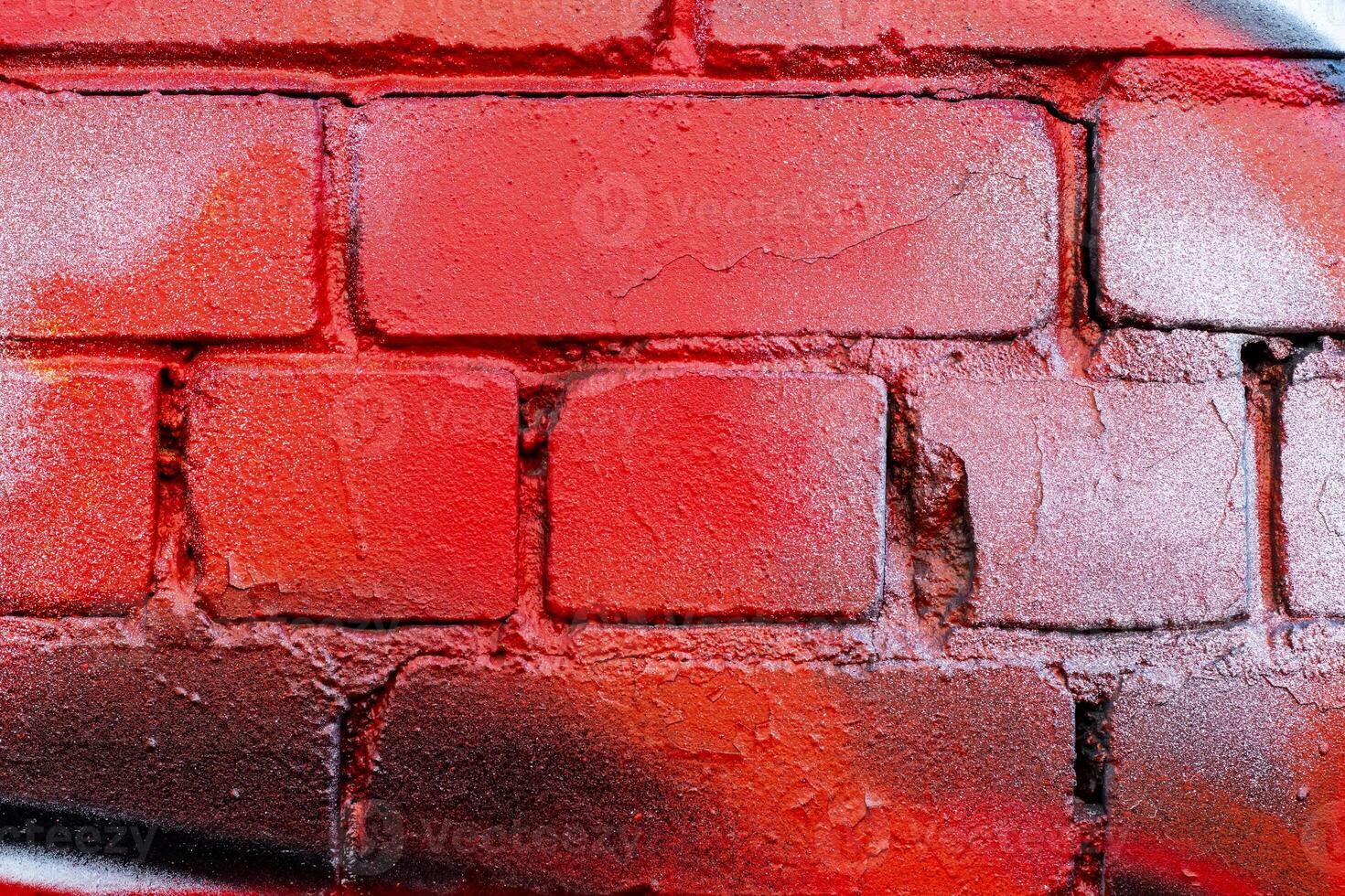 Graffiti painted on a brick wall texture. photo