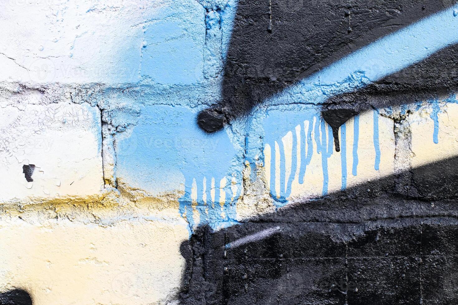 Graffiti painted on a brick wall texture. photo