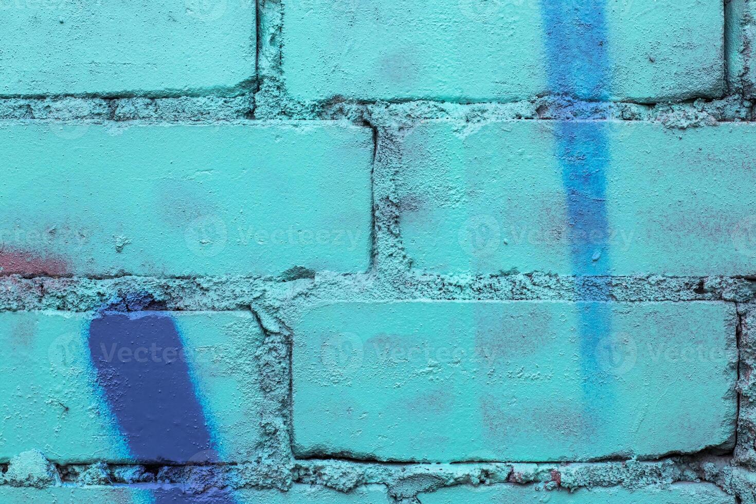 Graffiti painted on a brick wall texture. photo