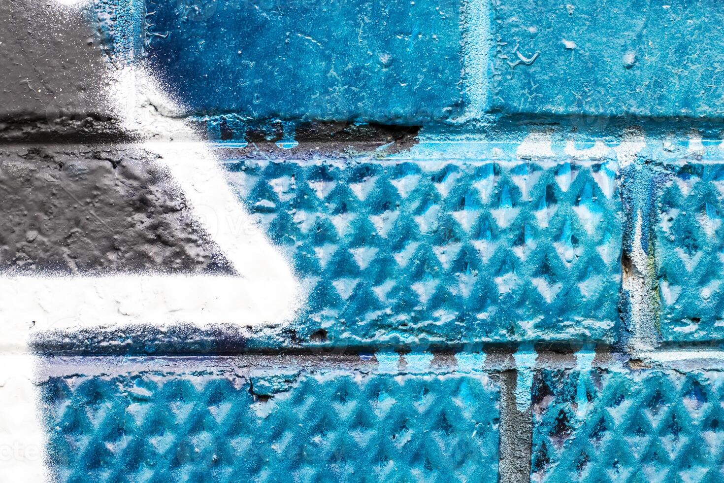 Graffiti painted on a brick wall texture. photo