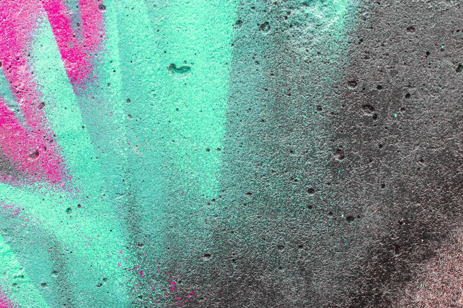 Graffiti painted on a concrete wall texture. photo