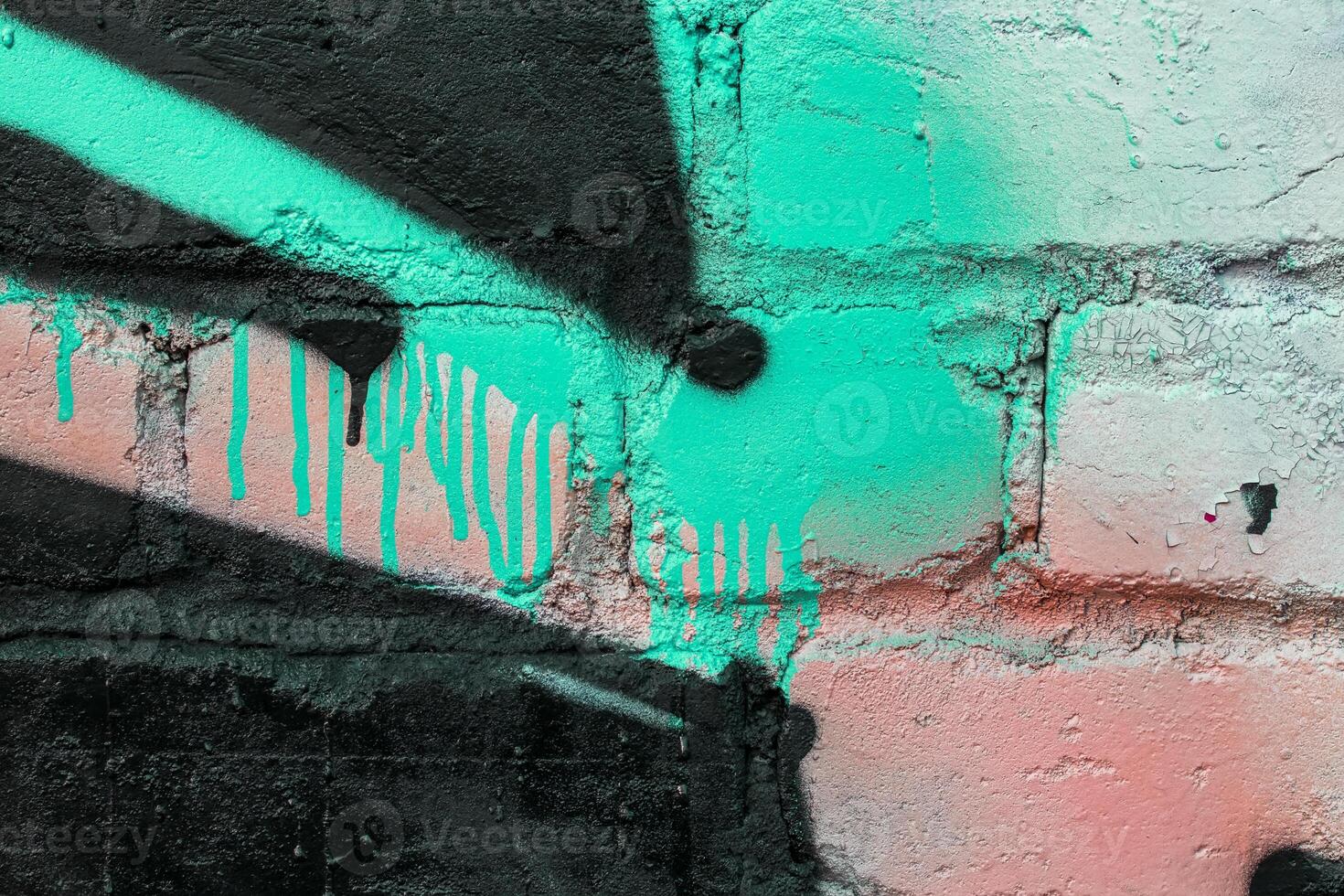 Graffiti painted on a brick wall texture. photo