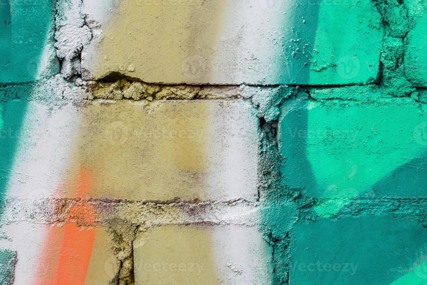 Graffiti painted on a brick wall texture. photo