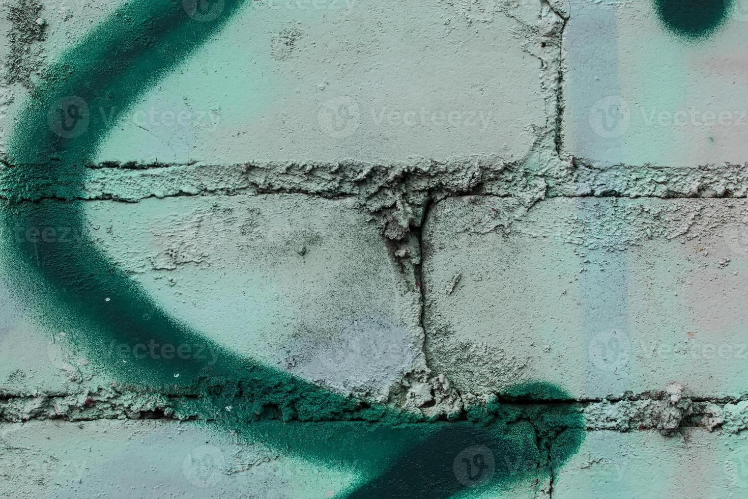 Graffiti painted on a brick wall texture. photo