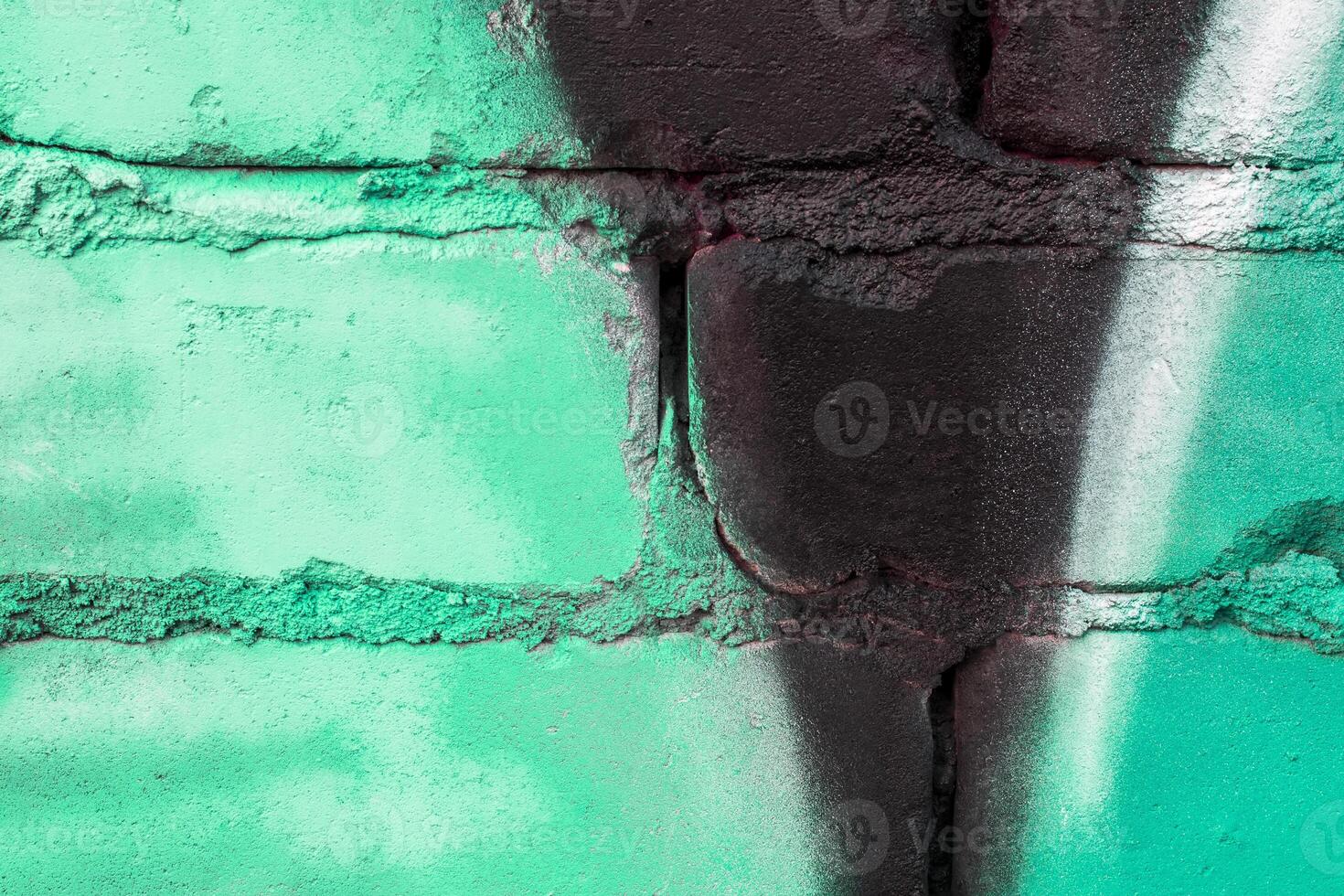 Graffiti painted on a brick wall texture. photo