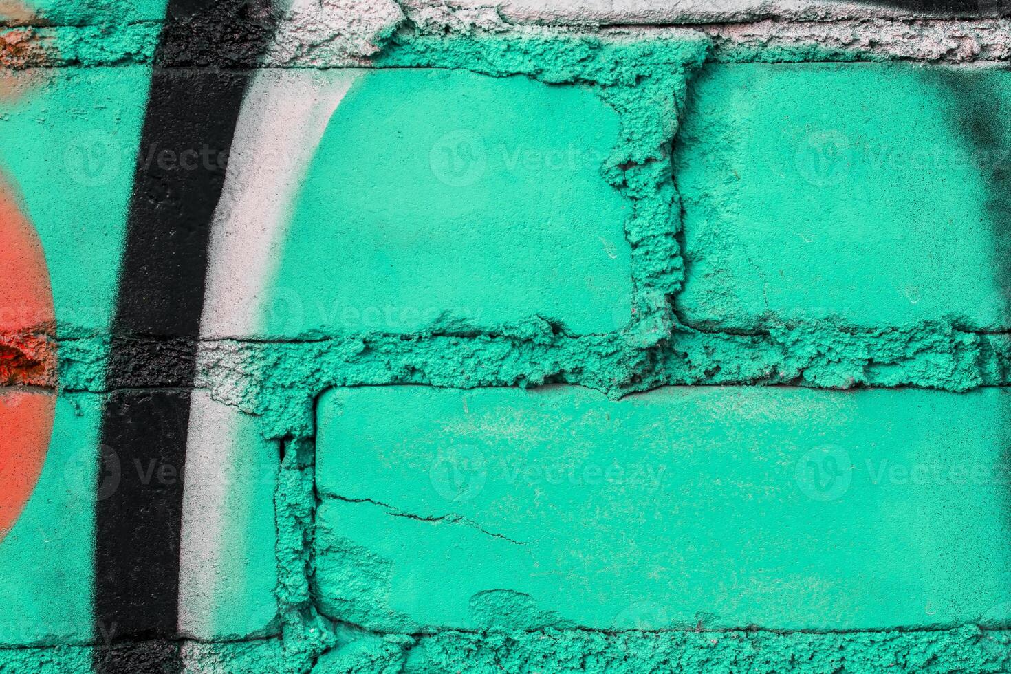Graffiti painted on a brick wall texture. photo