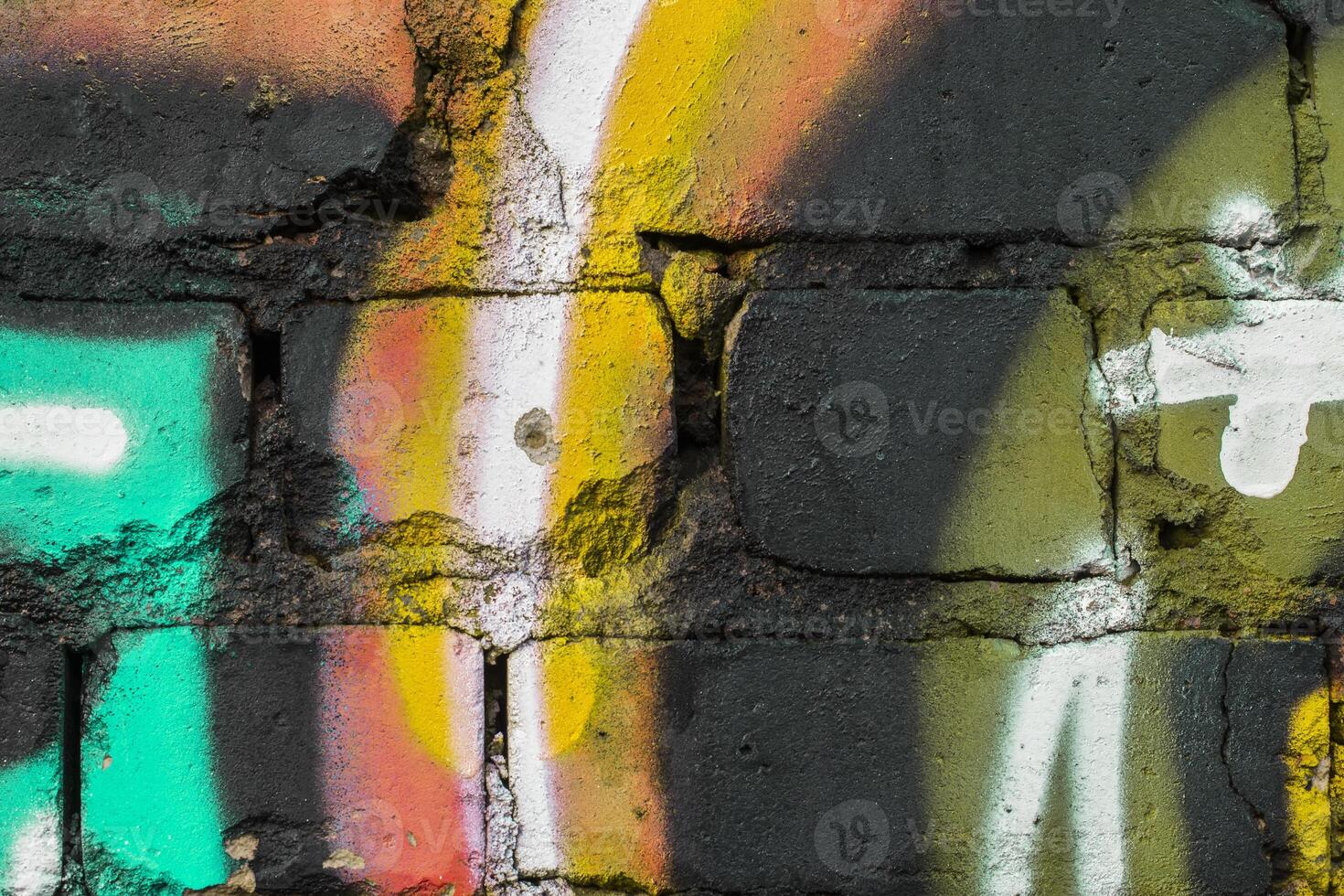 Graffiti painted on a brick wall texture. photo