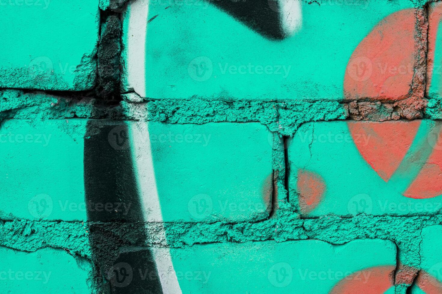 Graffiti painted on a brick wall texture. photo