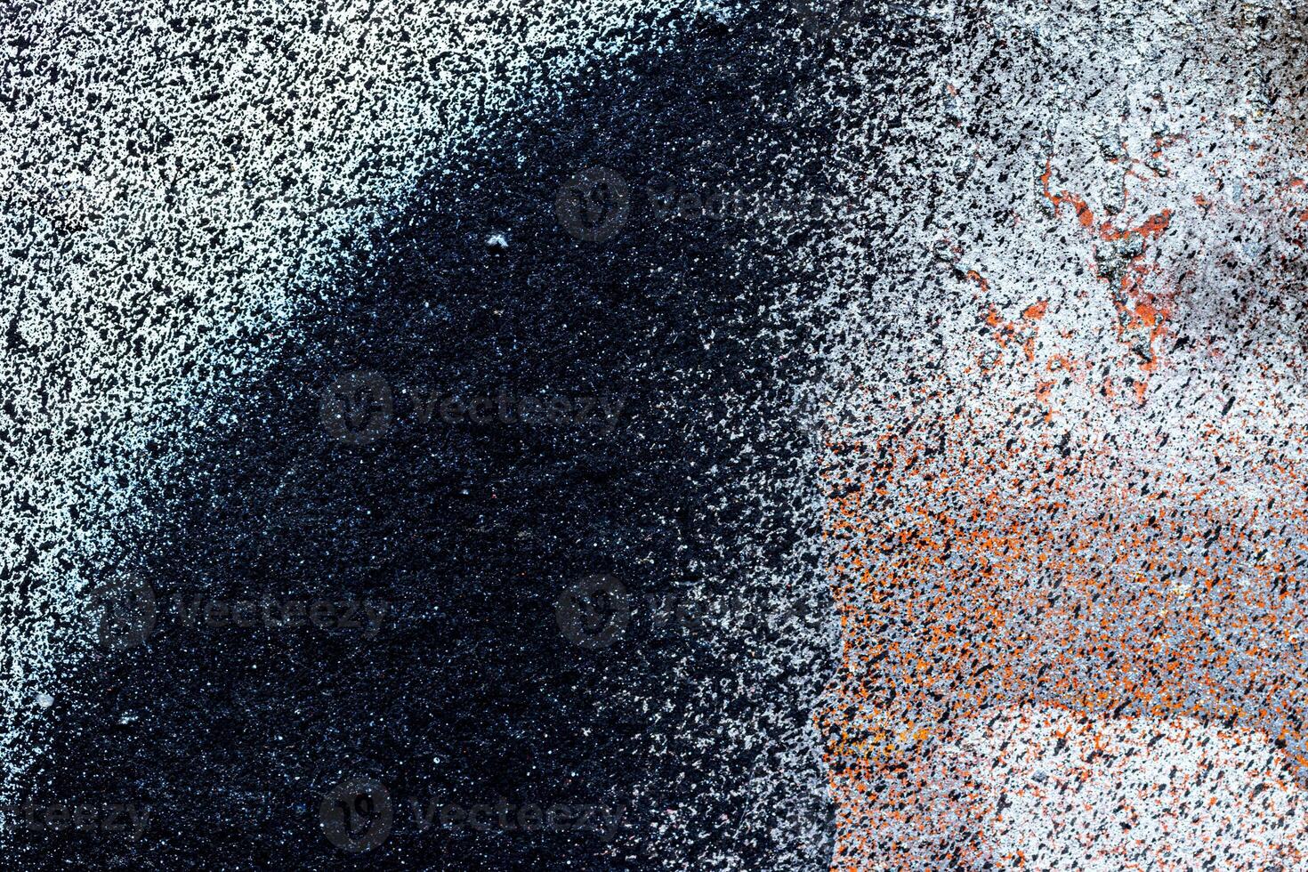 Fragment of colored graffiti painted on a wall. Bright abstract background. photo
