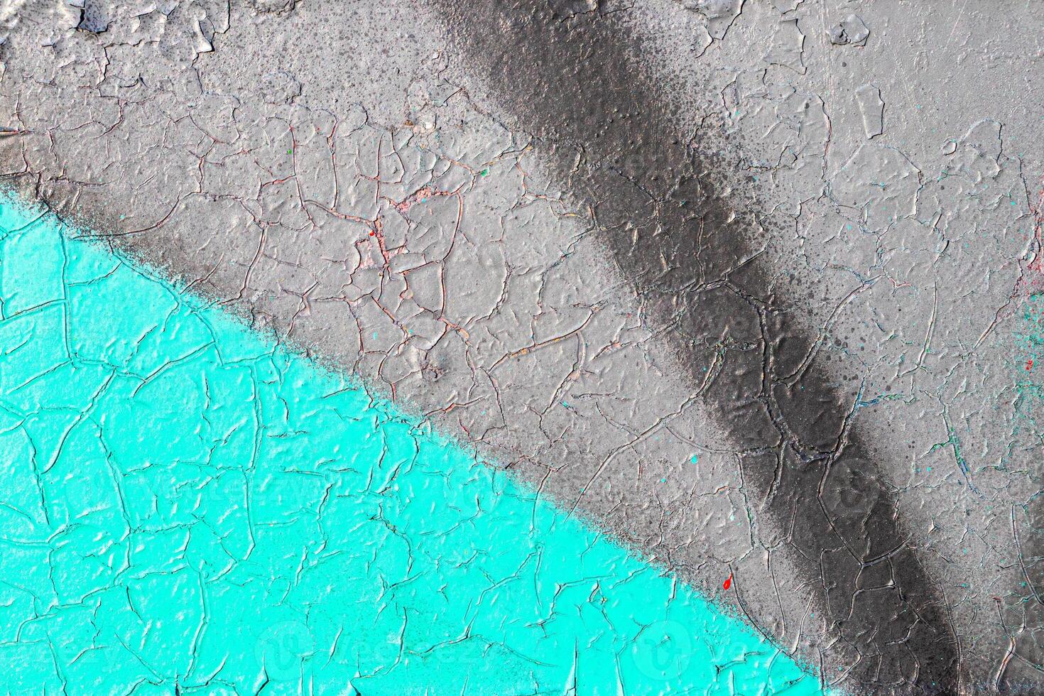 Fragment of colored graffiti painted on a wall. Bright abstract background. photo