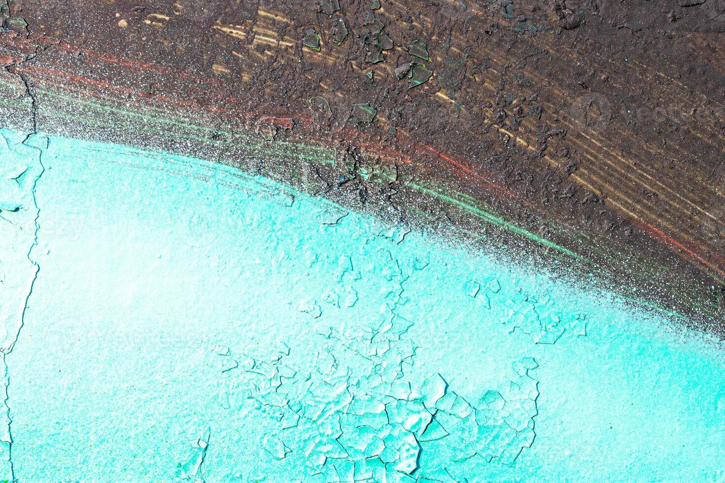 Fragment of colored graffiti painted on a wall. Bright abstract background. photo