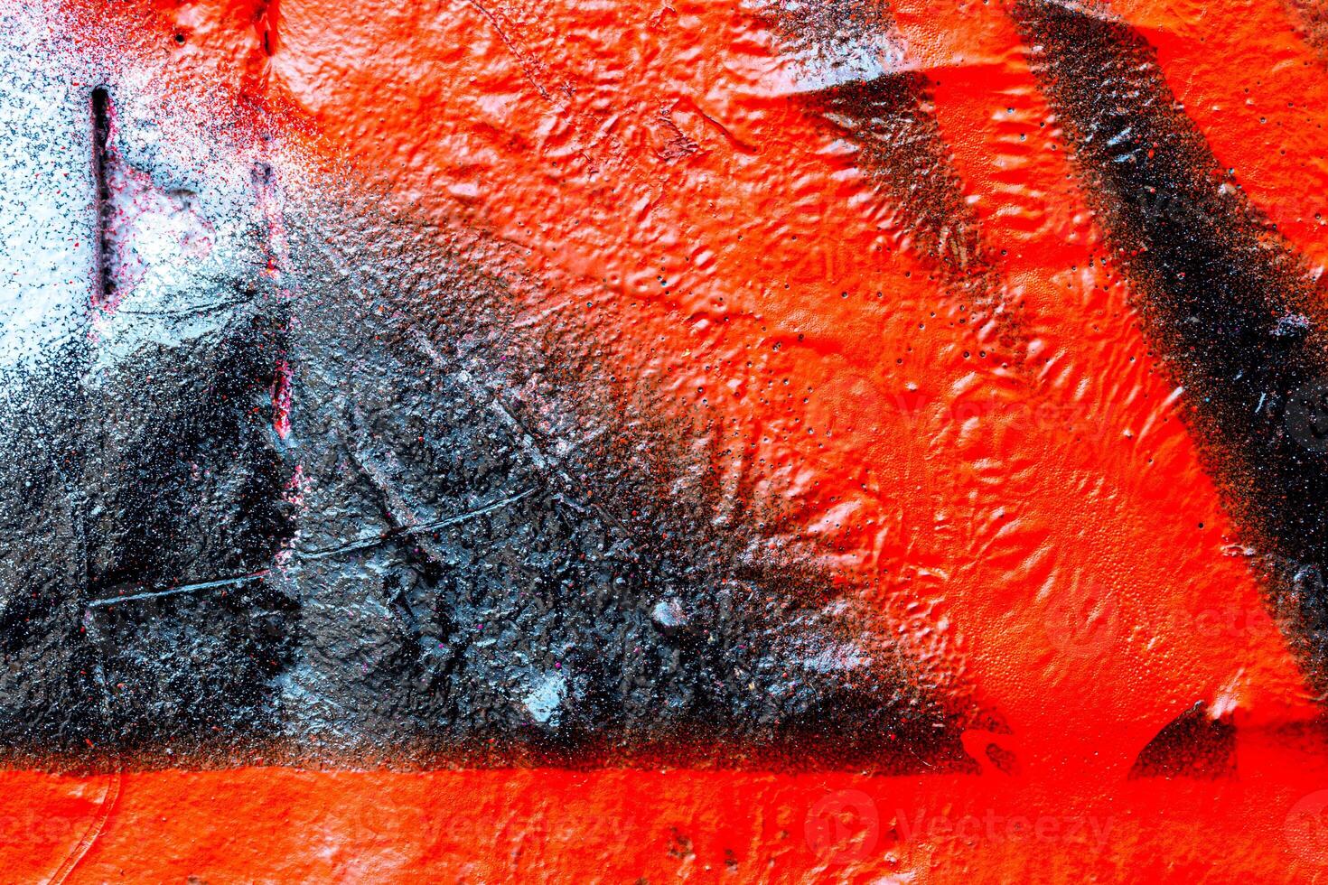 Fragment of colored graffiti painted on a wall. Bright abstract background. photo