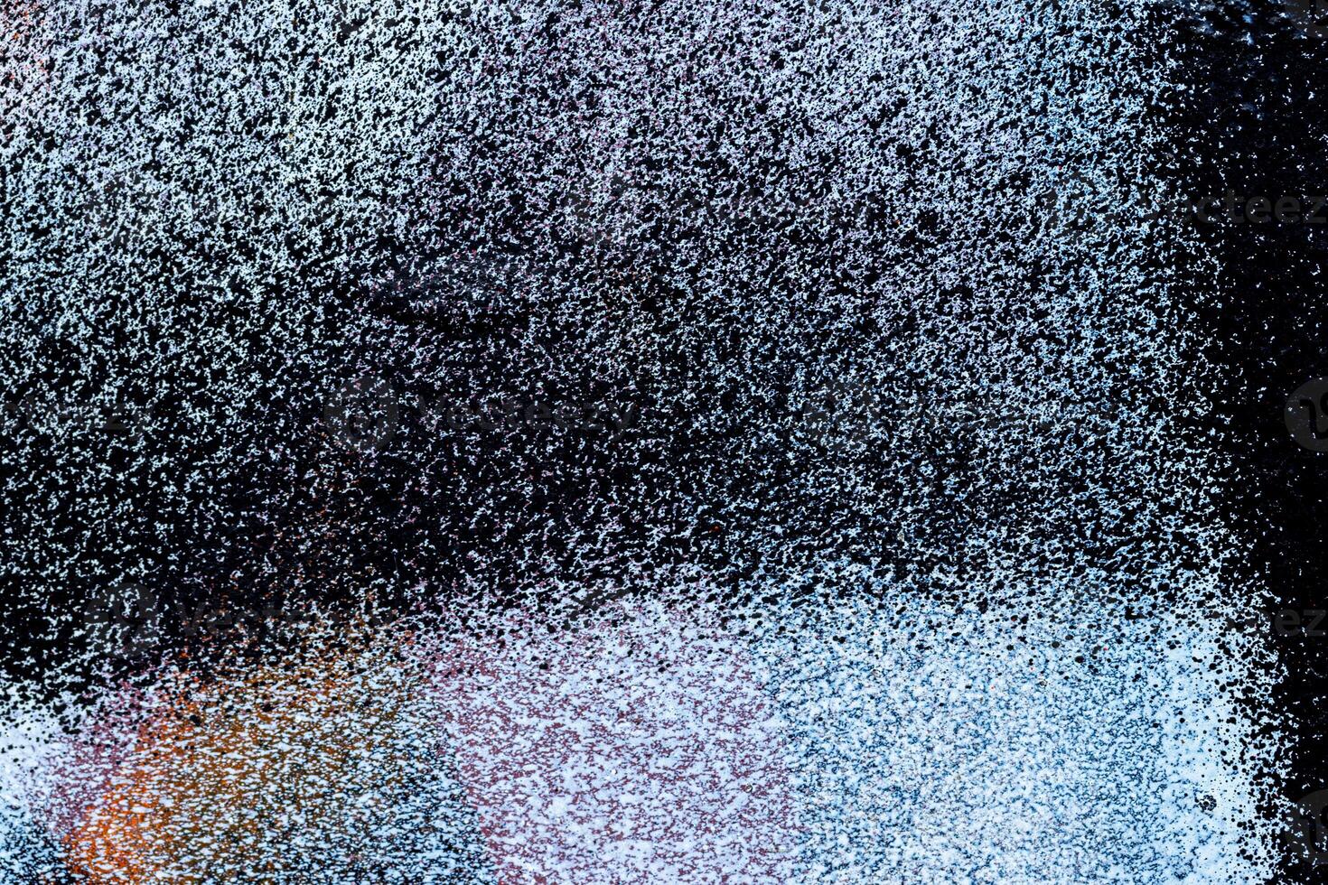 Fragment of colored graffiti painted on a wall. Bright abstract background. photo
