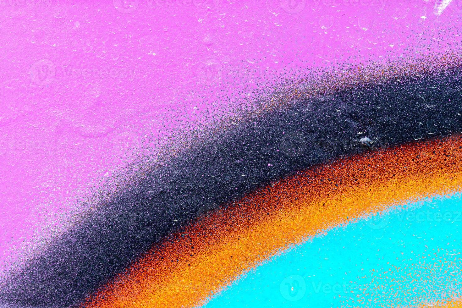 Fragment of colored graffiti painted on a wall. Bright abstract background. photo