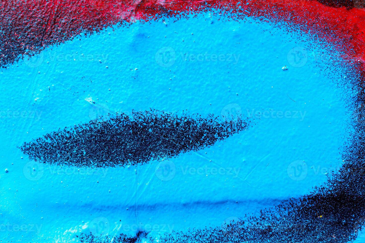 Fragment of colored graffiti painted on a wall. Bright abstract background. photo