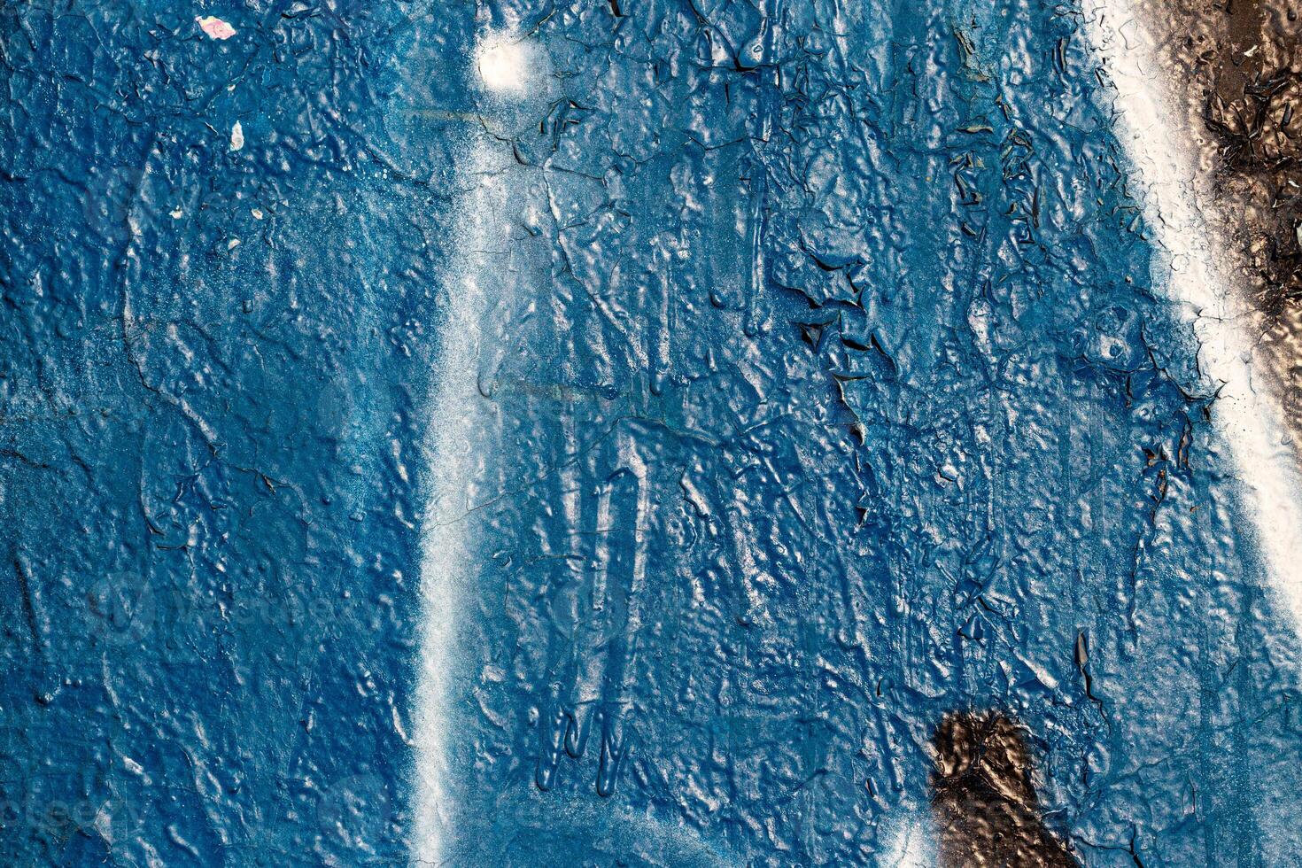Fragment of colored graffiti painted on a wall. Bright abstract background. photo