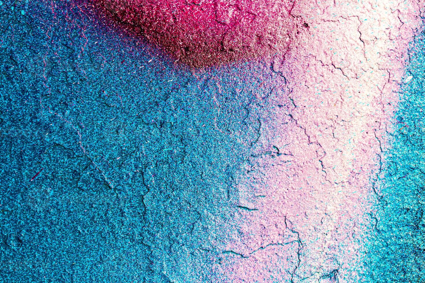 Fragment of colored graffiti painted on a wall. Bright abstract background. photo