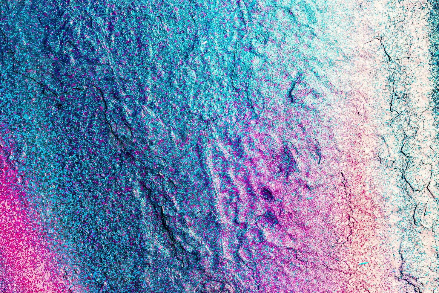 Fragment of colored graffiti painted on a wall. Bright abstract background. photo