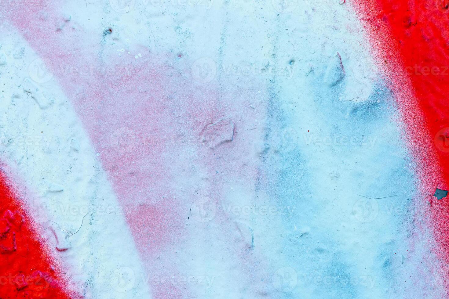 Fragment of colored graffiti painted on a wall. Bright abstract background. photo
