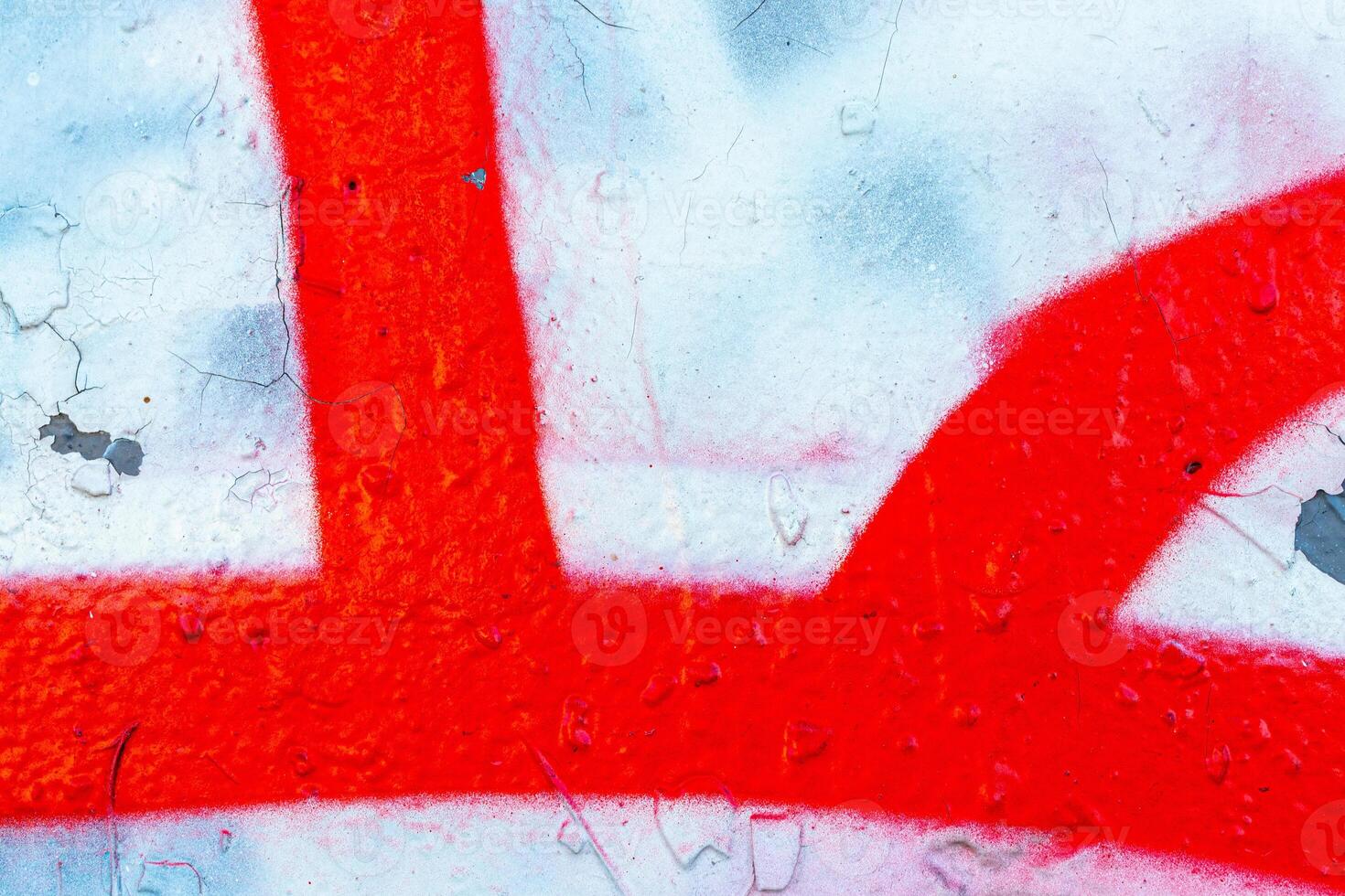 Fragment of colored graffiti painted on a wall. Bright abstract background. photo