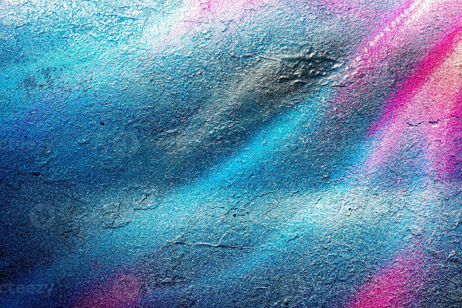 Fragment of colored graffiti painted on a wall. Bright abstract background. photo