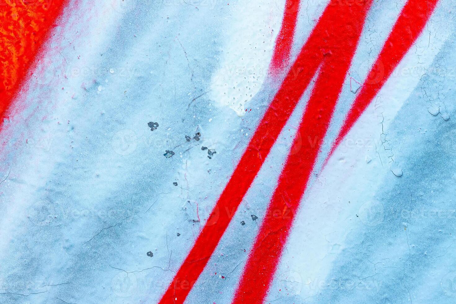 Fragment of colored graffiti painted on a wall. Bright abstract background. photo