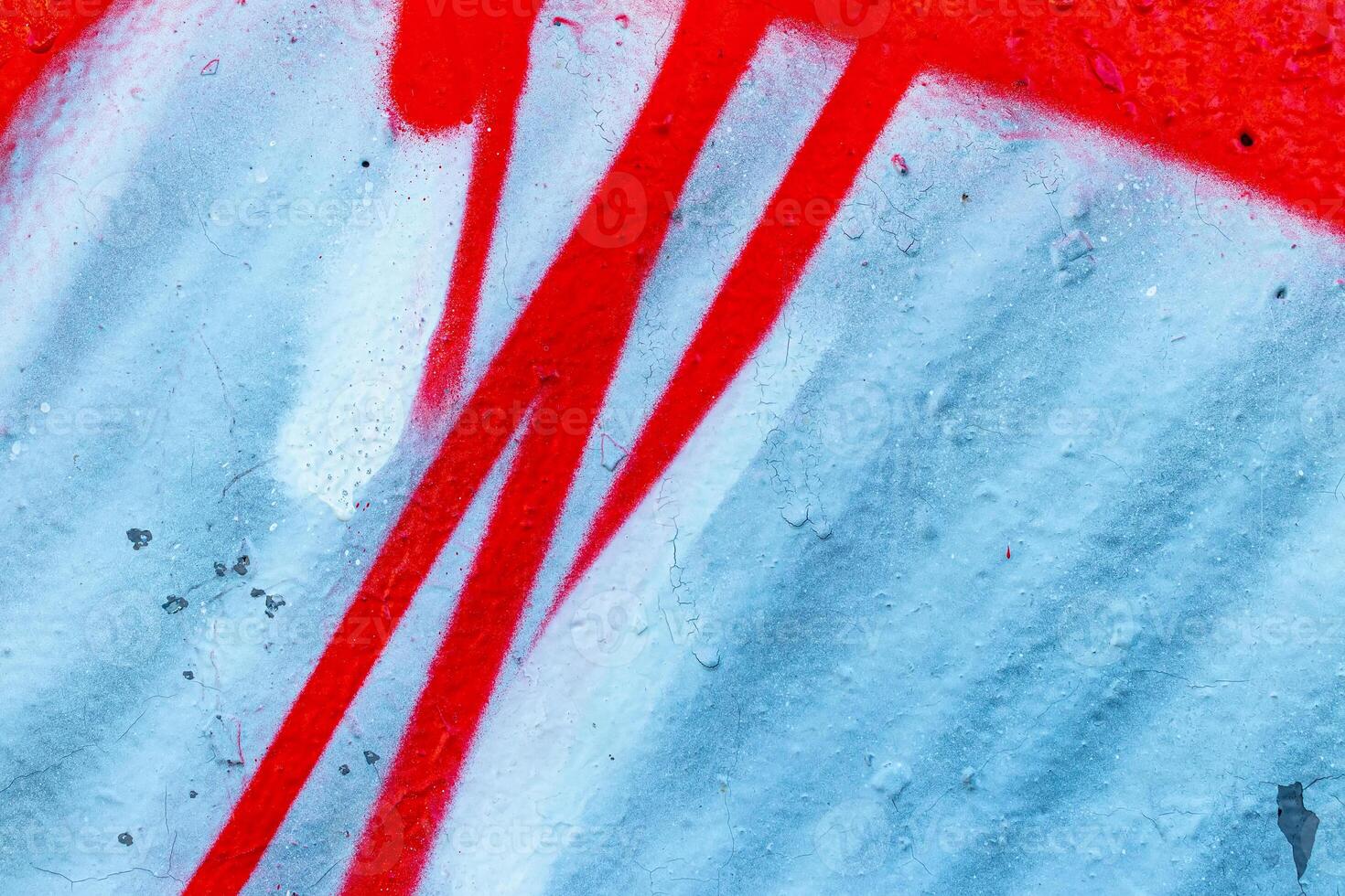 Fragment of colored graffiti painted on a wall. Bright abstract background. photo