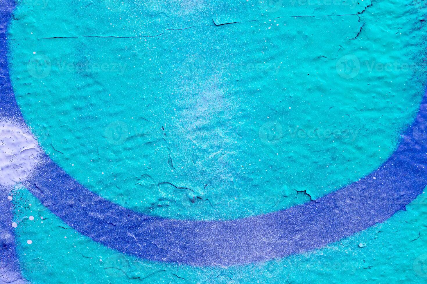 Fragment of colored graffiti painted on a wall. Bright abstract background. photo