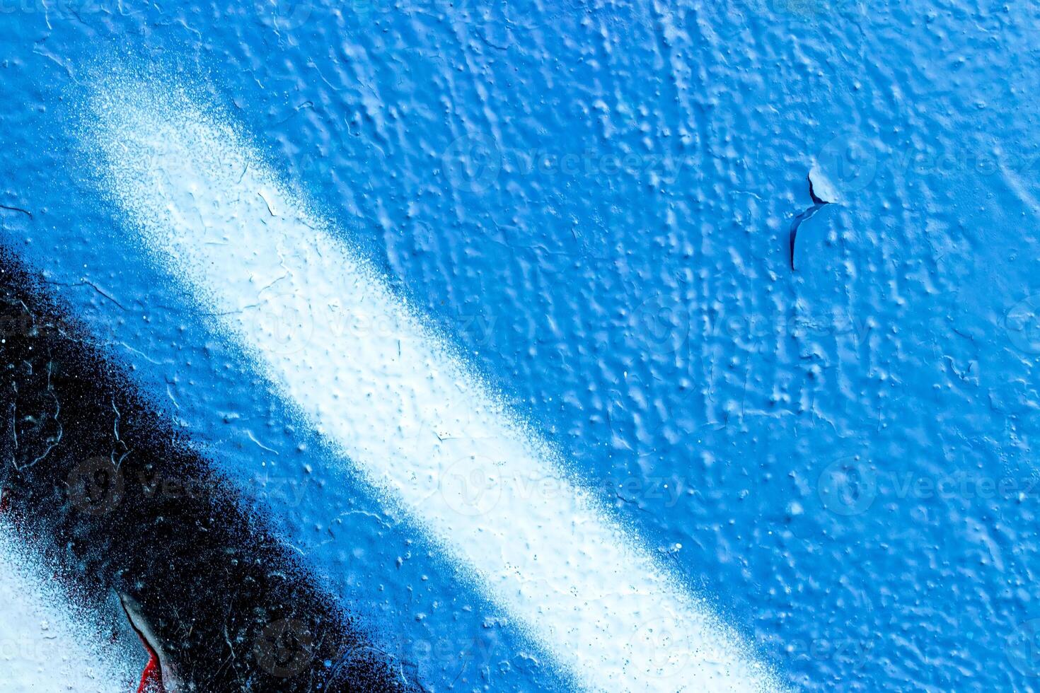 Fragment of colored graffiti painted on a wall. Bright abstract background. photo