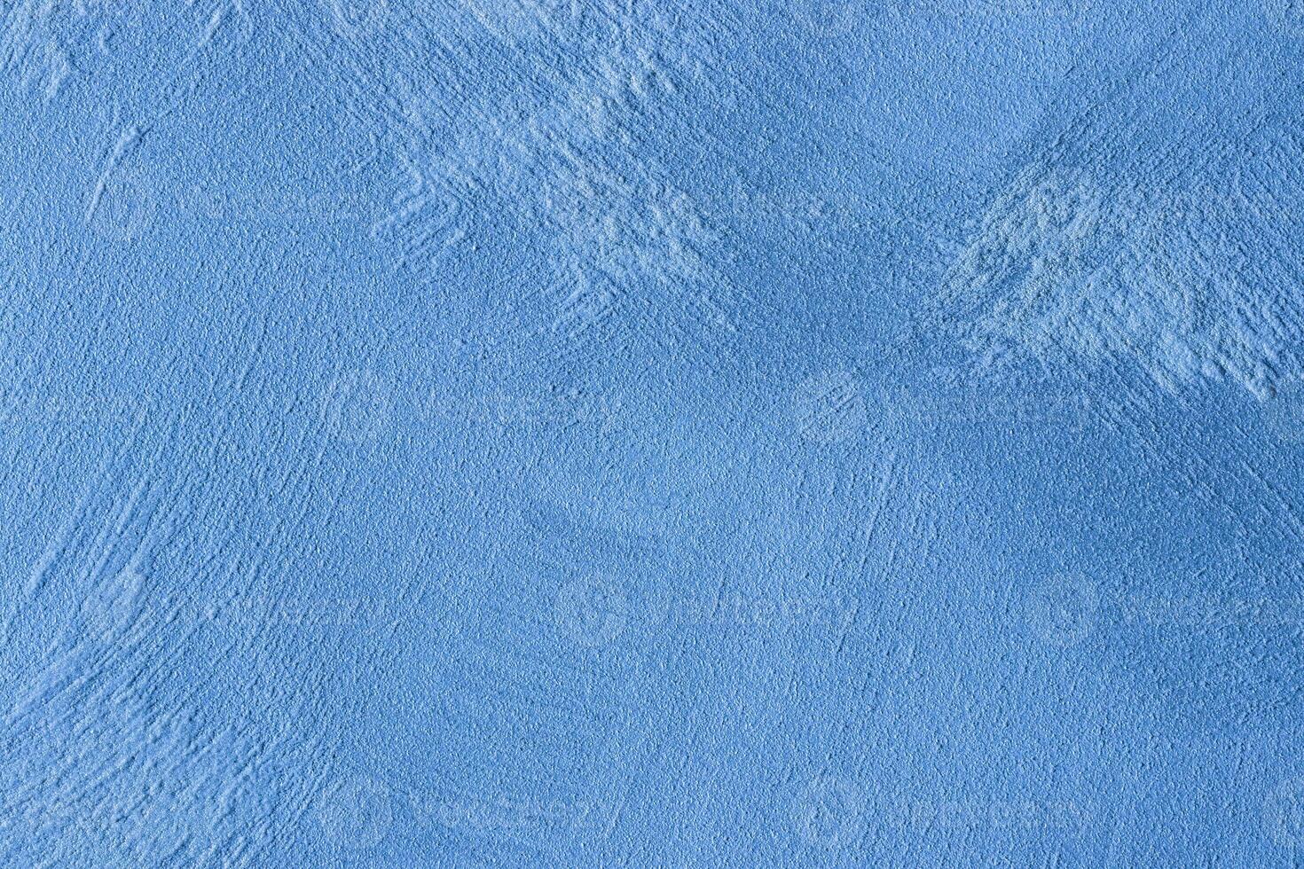 Texture of blue decorative plaster or stucco or concrete. Abstract background for design. photo