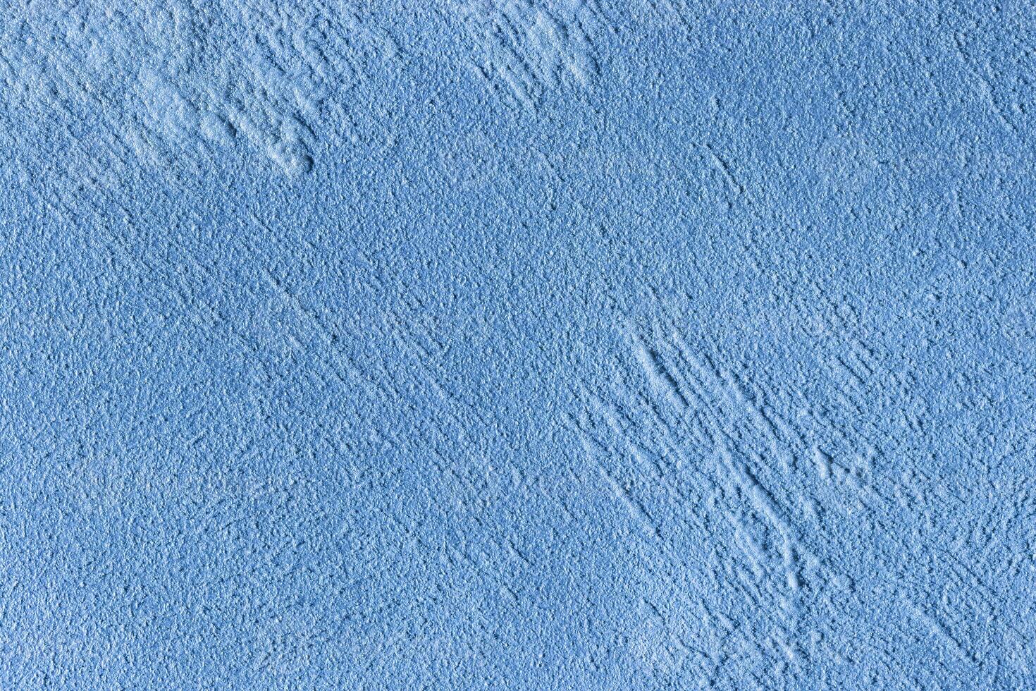 Texture of blue decorative plaster or stucco or concrete. Abstract background for design. photo