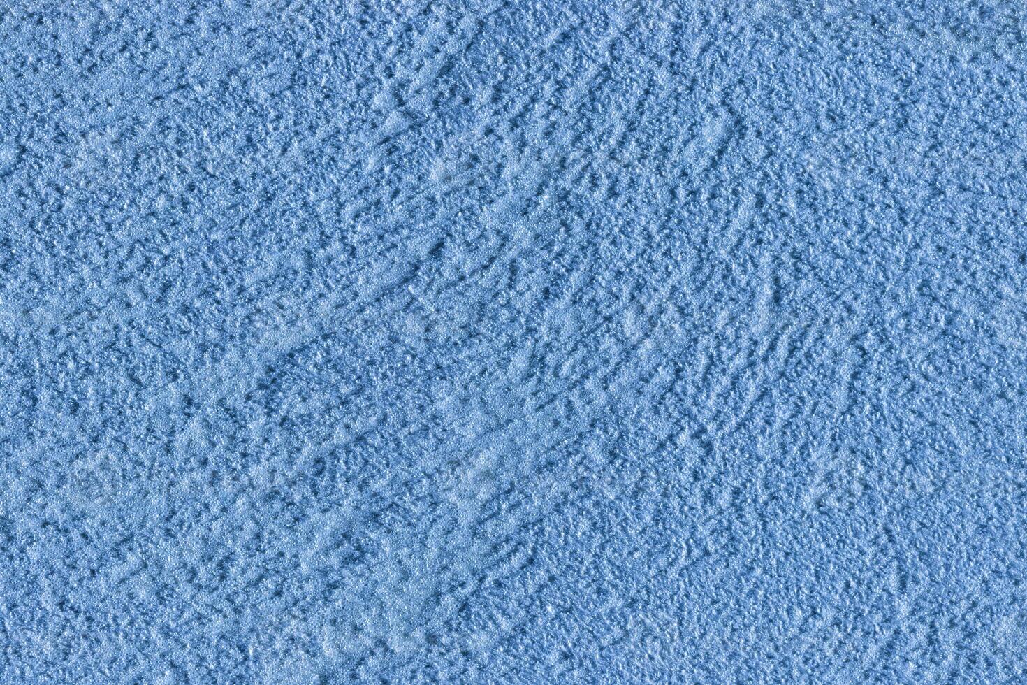 Texture of blue decorative plaster or stucco or concrete. Abstract background for design. photo