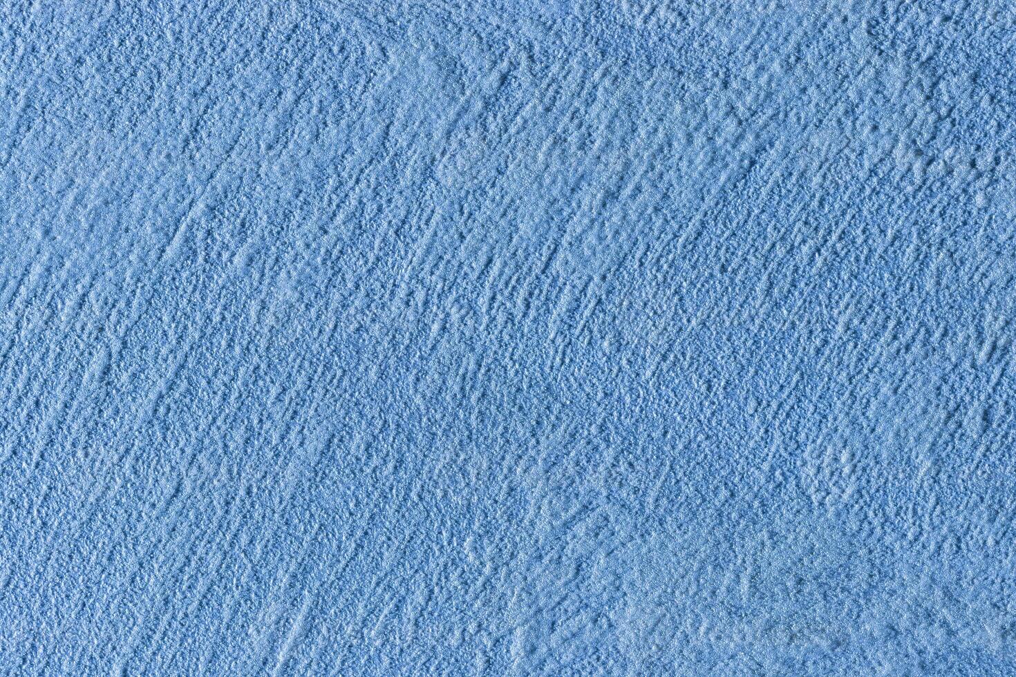 Texture of blue decorative plaster or stucco or concrete. Abstract background for design. photo