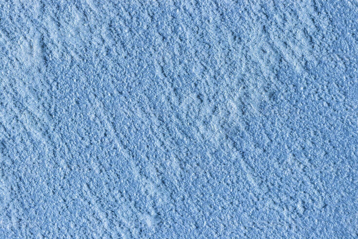 Texture of blue decorative plaster or stucco or concrete. Abstract background for design. photo