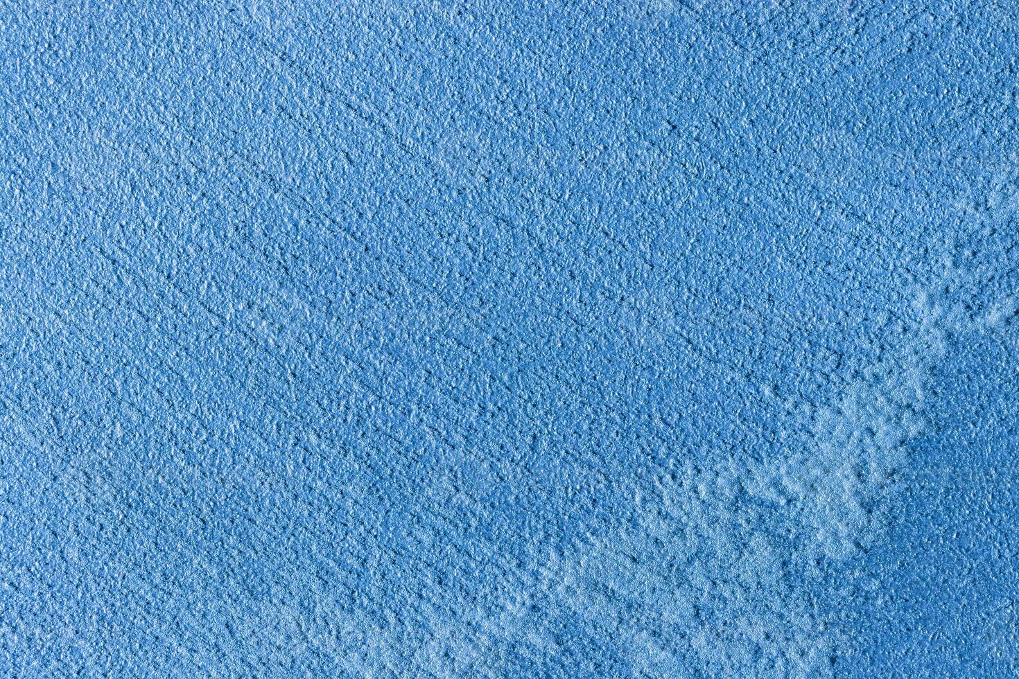 Texture of blue decorative plaster or stucco or concrete. Abstract background for design. photo