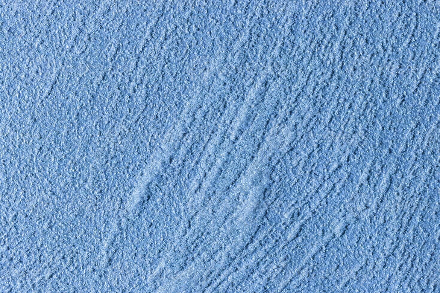 Texture of blue decorative plaster or stucco or concrete. Abstract background for design. photo