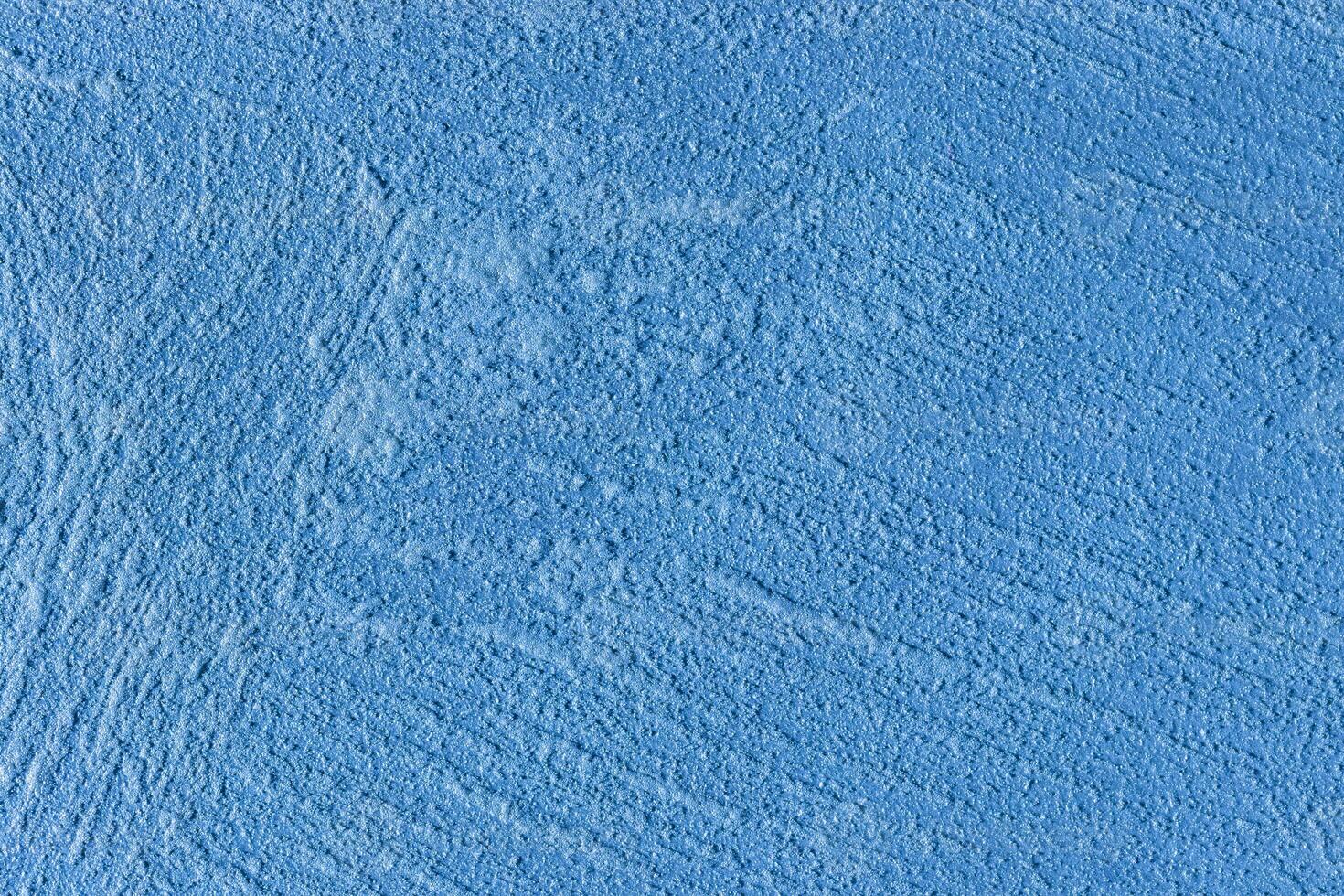 Texture of blue decorative plaster or stucco or concrete. Abstract background for design. photo