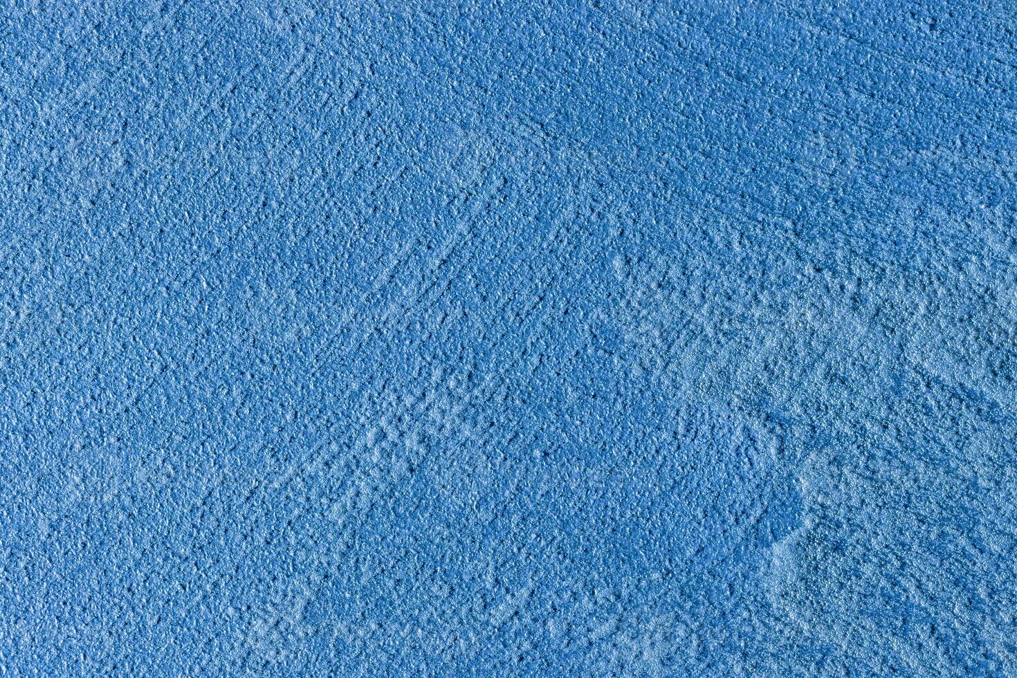 Texture of blue decorative plaster or stucco or concrete. Abstract background for design. photo