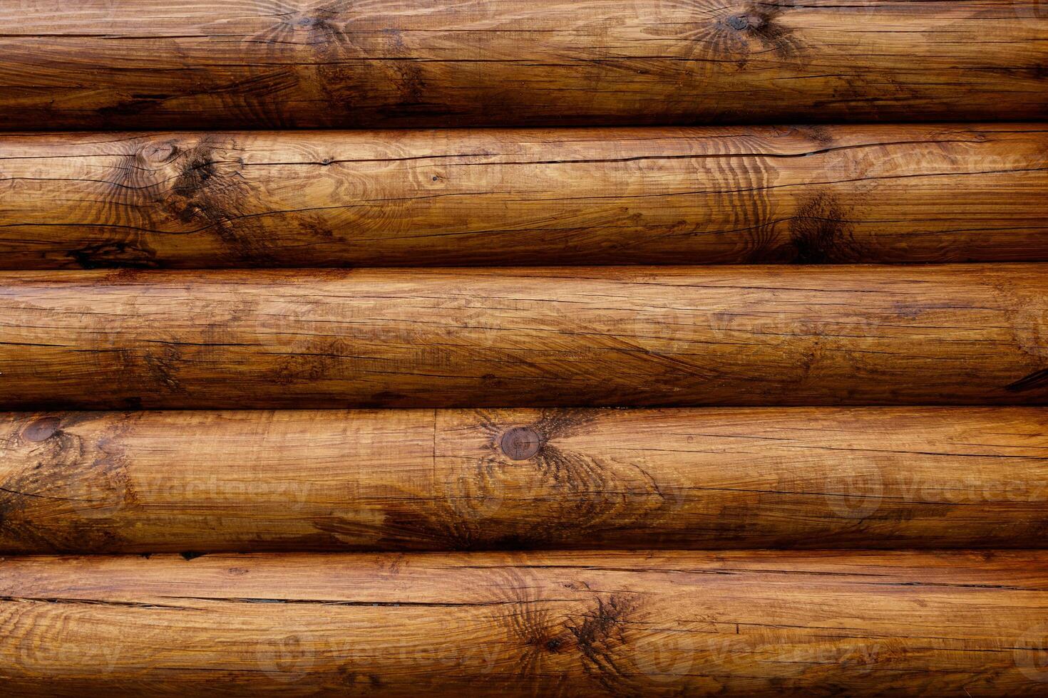 Wooden wall from logs as a background. photo
