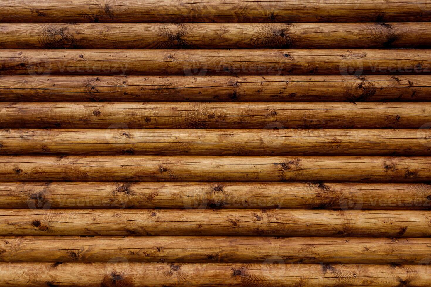 Wooden wall from logs as a background. photo