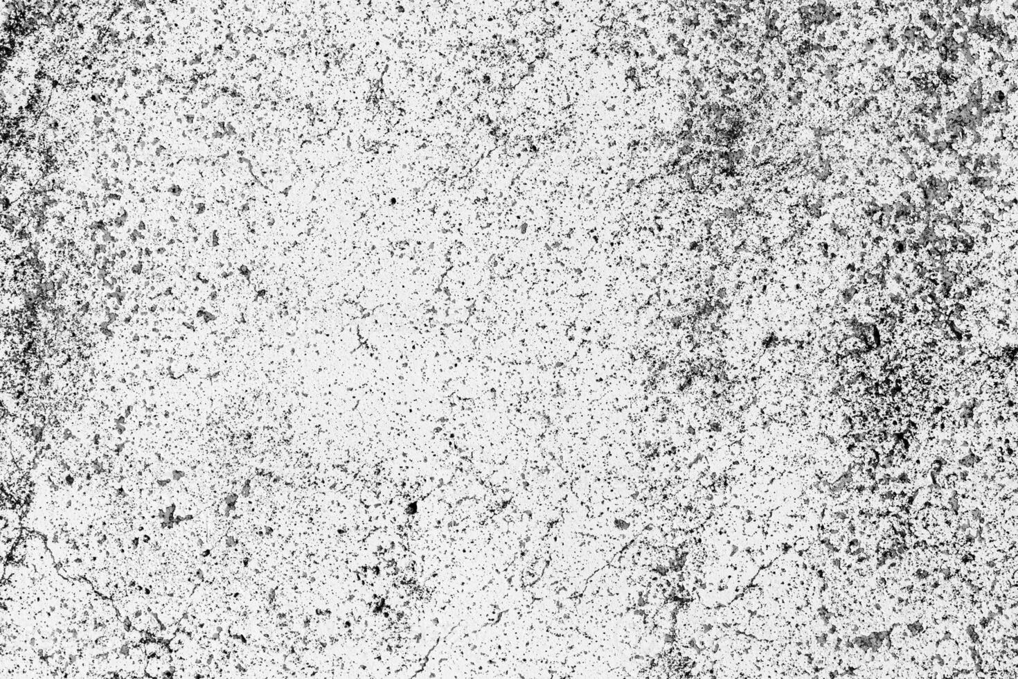 Black and white texture of a concrete wall. Abstract backdrop for design with copy space for a text. photo
