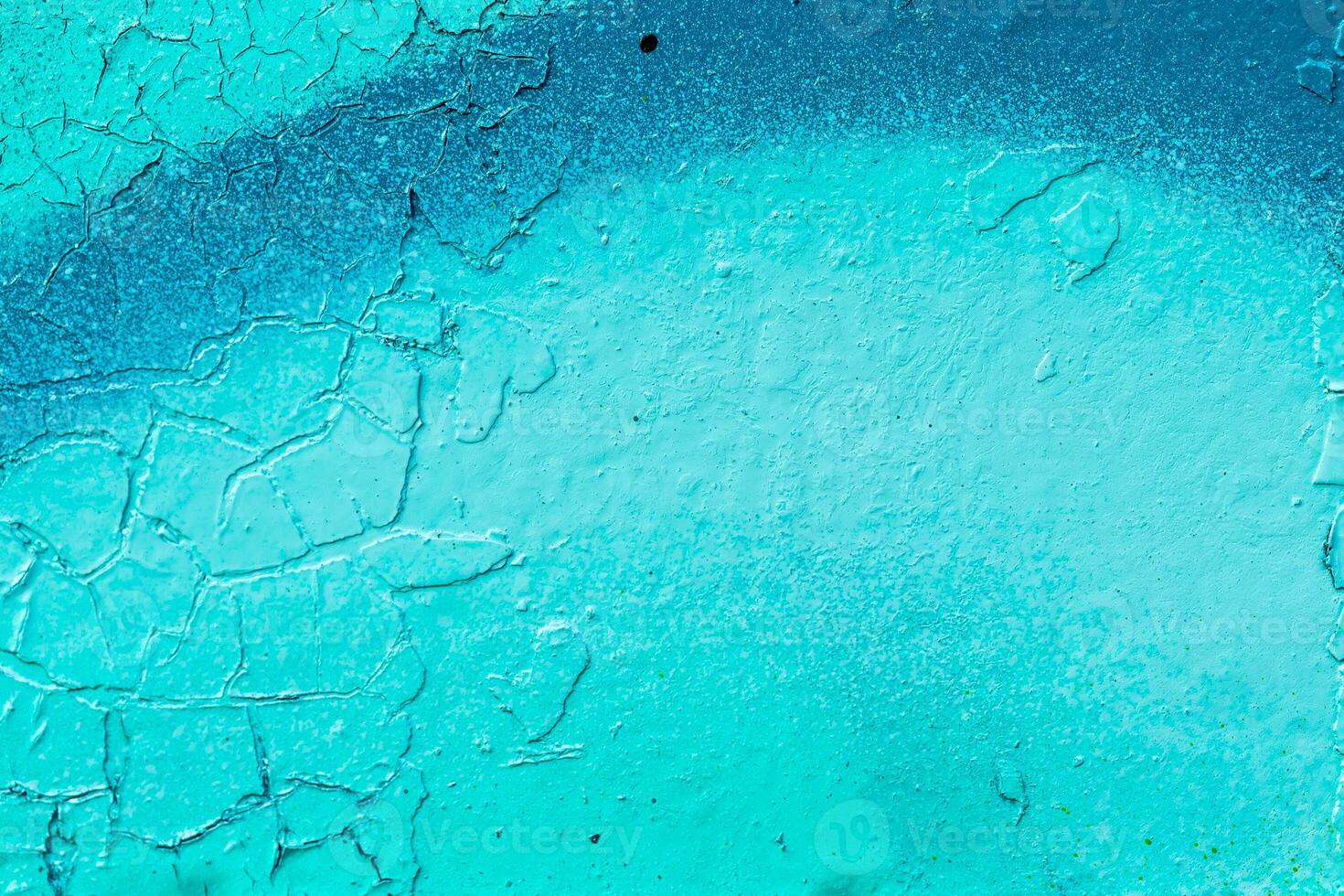 Fragment of colored graffiti painted on a stone wall. Old peeling paint. photo