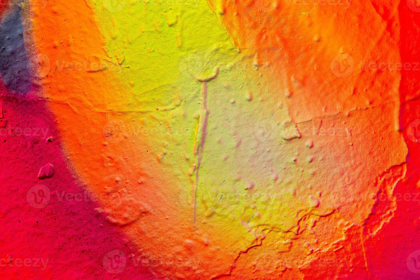 Fragment of colored graffiti painted on a concrete wall. photo