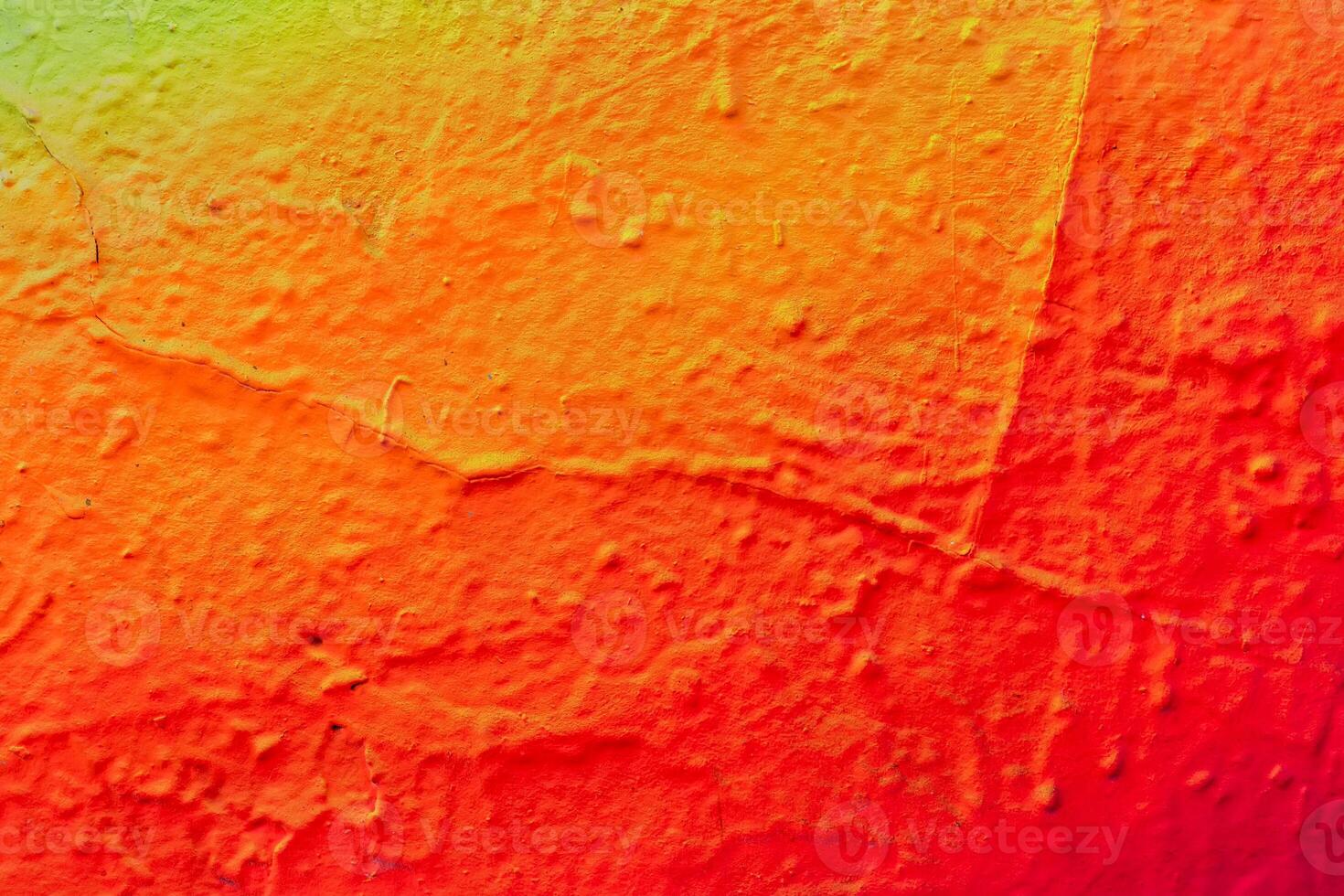 Fragment of colored graffiti painted on a wall. photo